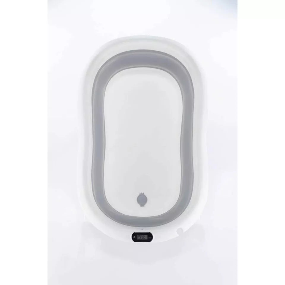 Sulankstoma kūdikio vonelė su termometru ir silikoniniu gultuku BATH&CARE Pink