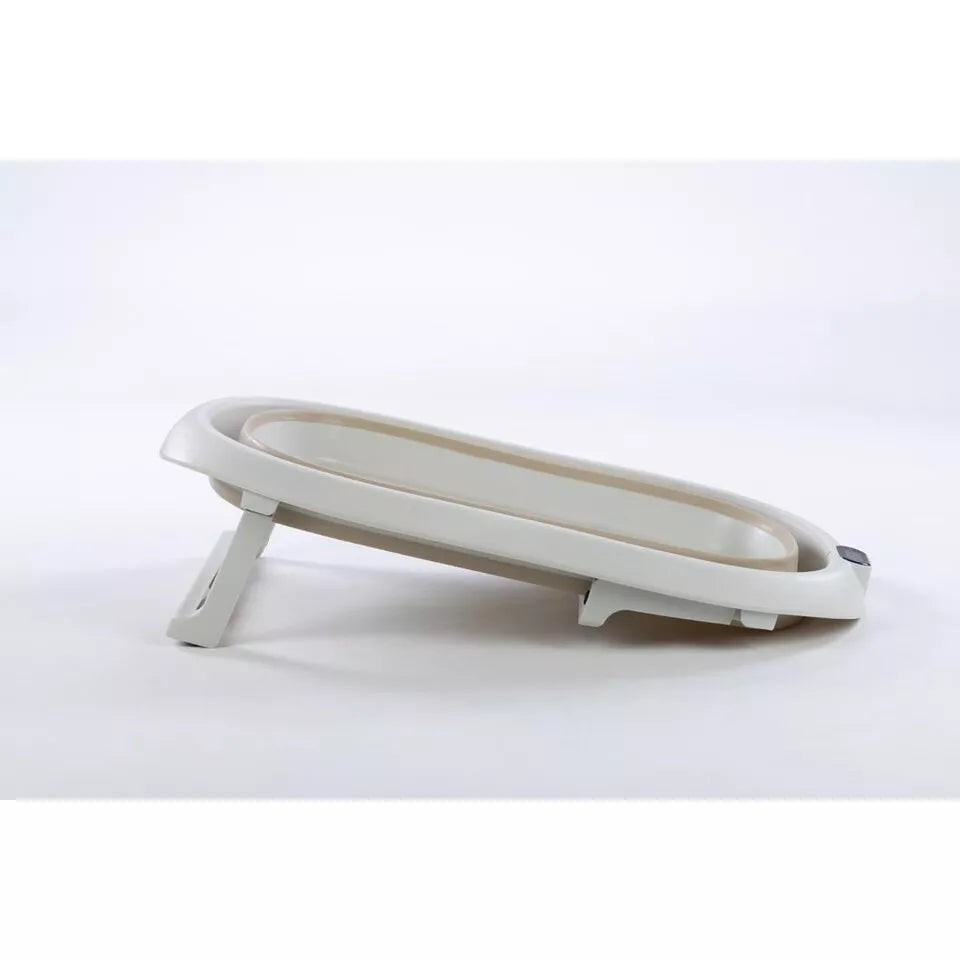 Sulankstoma kūdikio vonelė su termometru ir silikoniniu gultuku BATH&CARE Beige